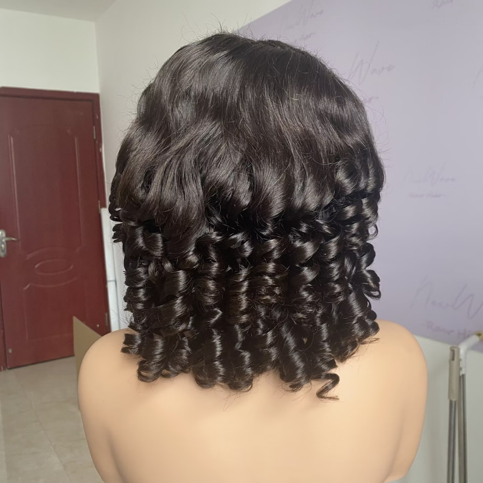 BOPP Hair 16, a 14-inch Loose Wave human-hair wig in Dark Brown