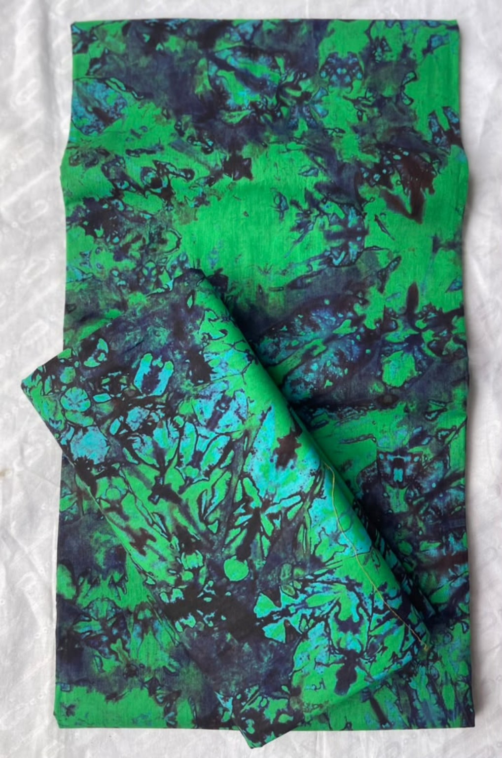 Five-yard emerald green, teal and navy marbled fabric design