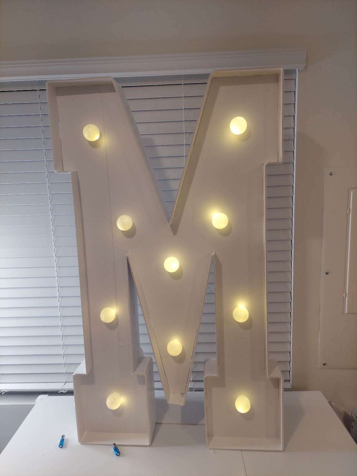 Letter M illuminated white marquee display sample