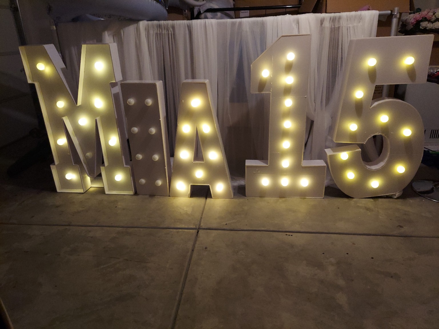 MIA 15 illuminated white marquee display sample