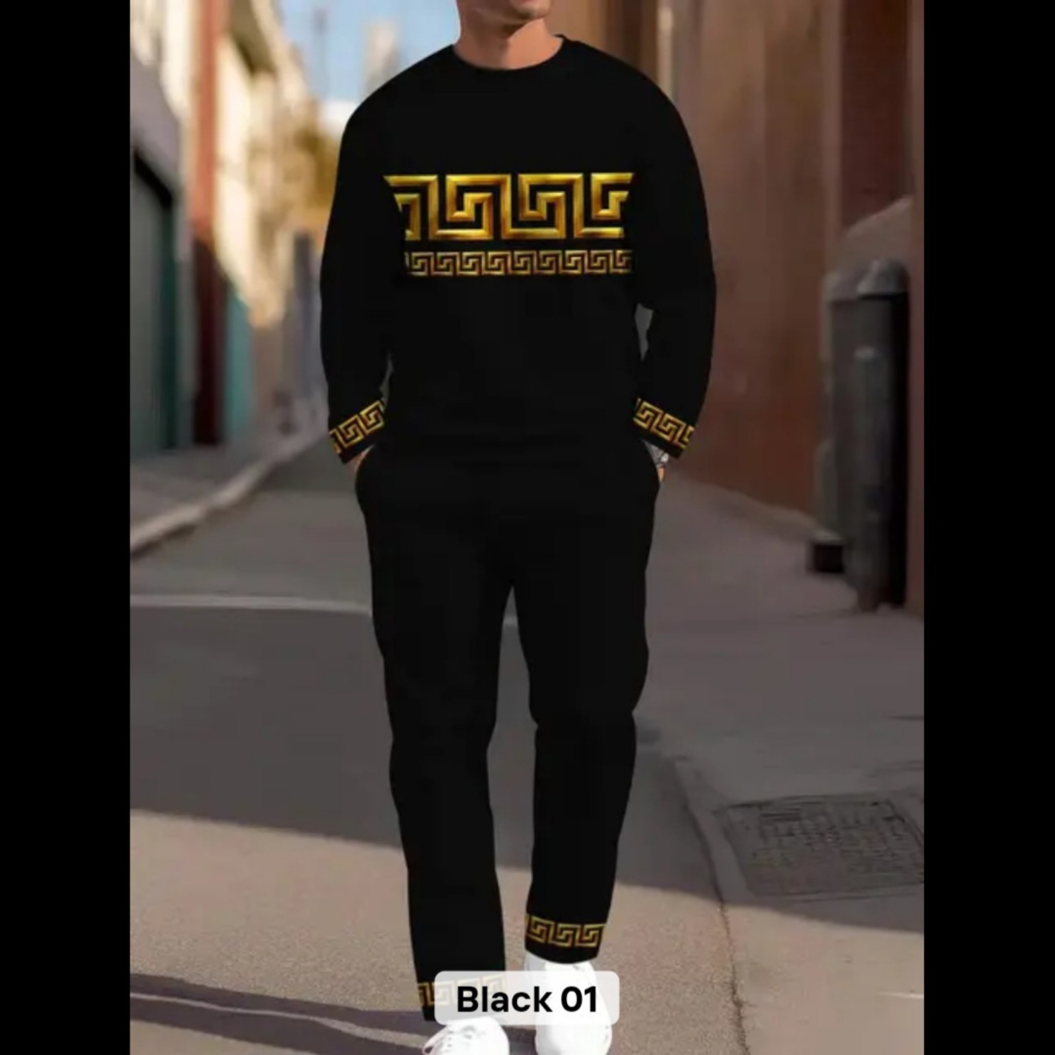 Men’s black two-piece tracksuit with gold geometric trim, crew-neck sweatshirt and jogger pants