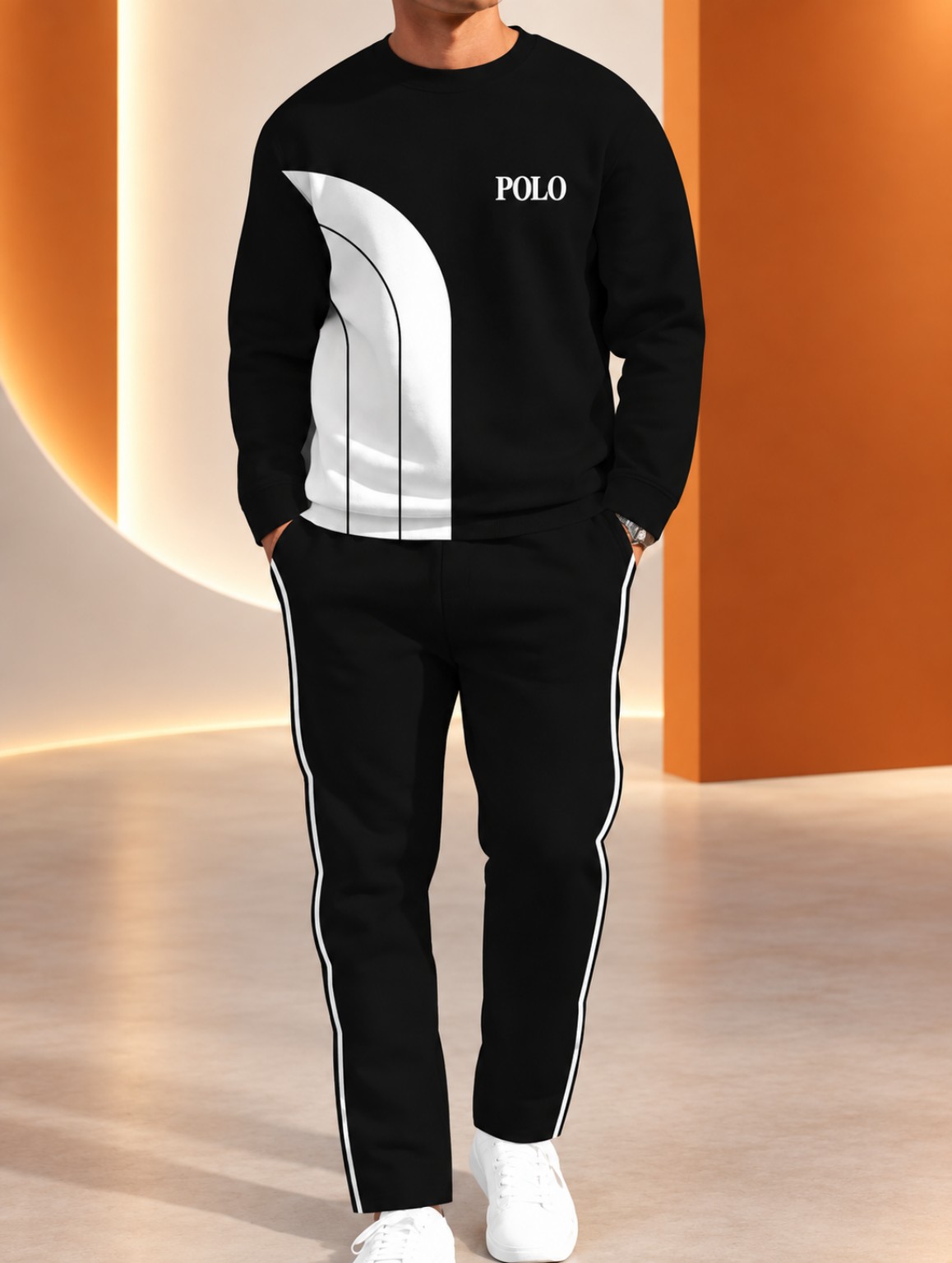 Men’s black two-piece tracksuit with a white curved front panel, crew-neck sweatshirt and jogger pants