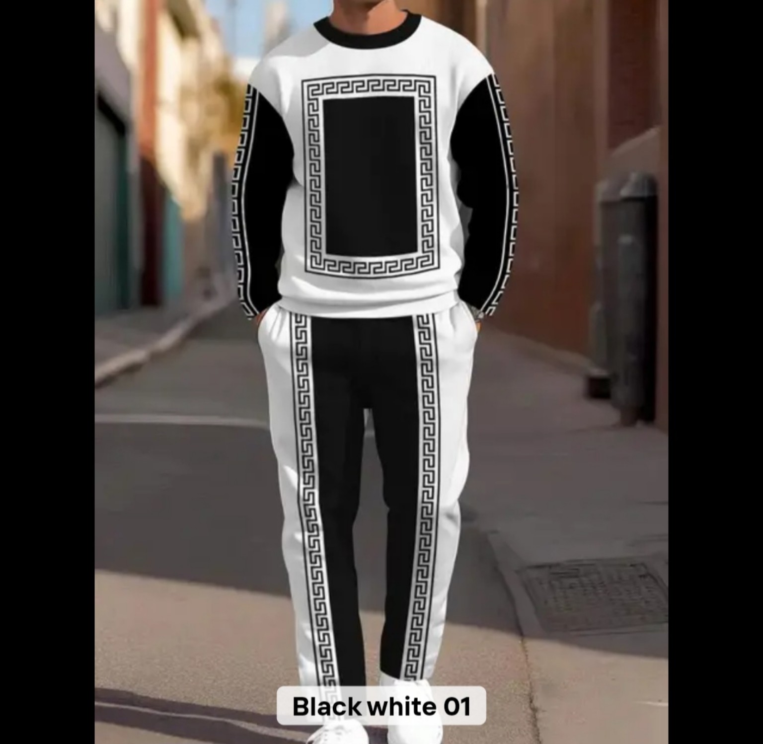 Men’s black-and-white two-piece tracksuit with geometric trim, crew-neck sweatshirt and matching jogger pants