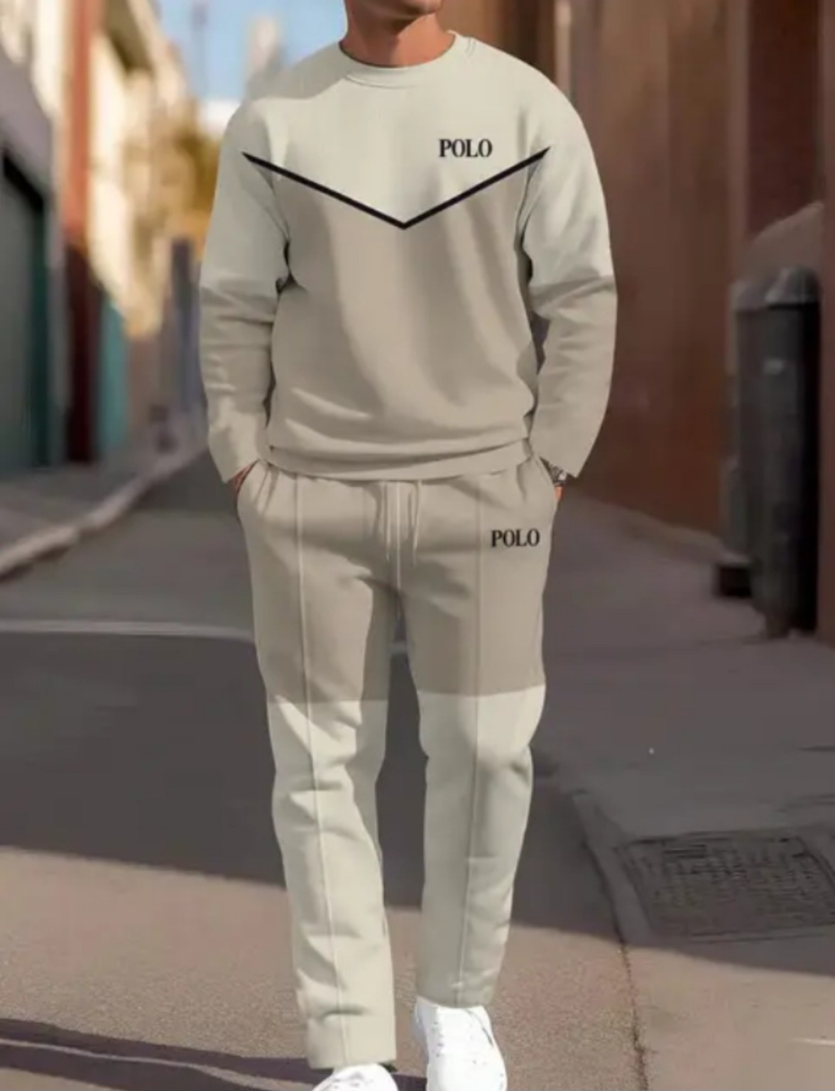 Men’s cream two-piece tracksuit with a black V-stripe crew-neck sweatshirt and matching jogger pants