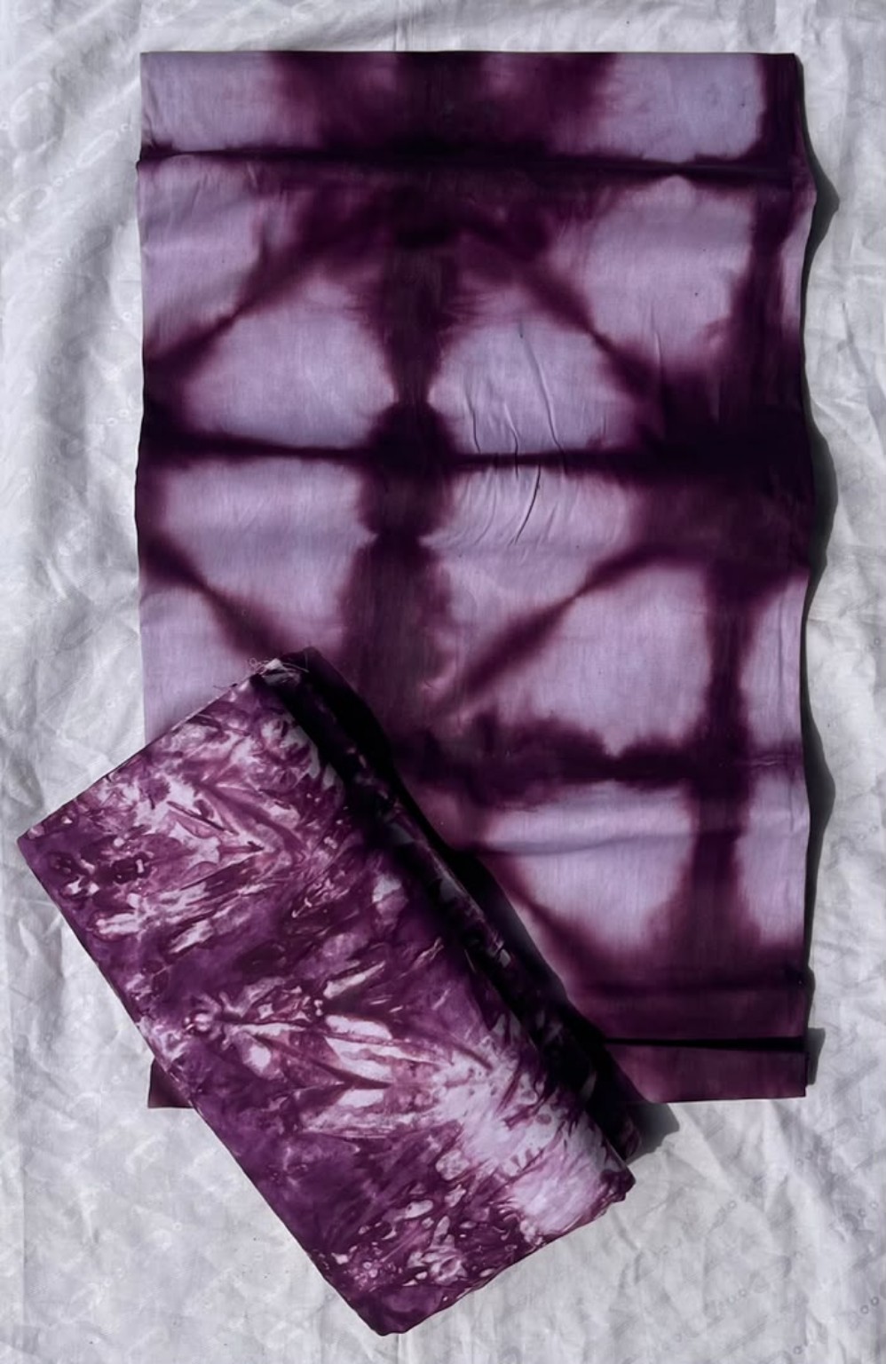 Five-yard deep plum and lilac tie-dye fabric with geometric and marbled patterns