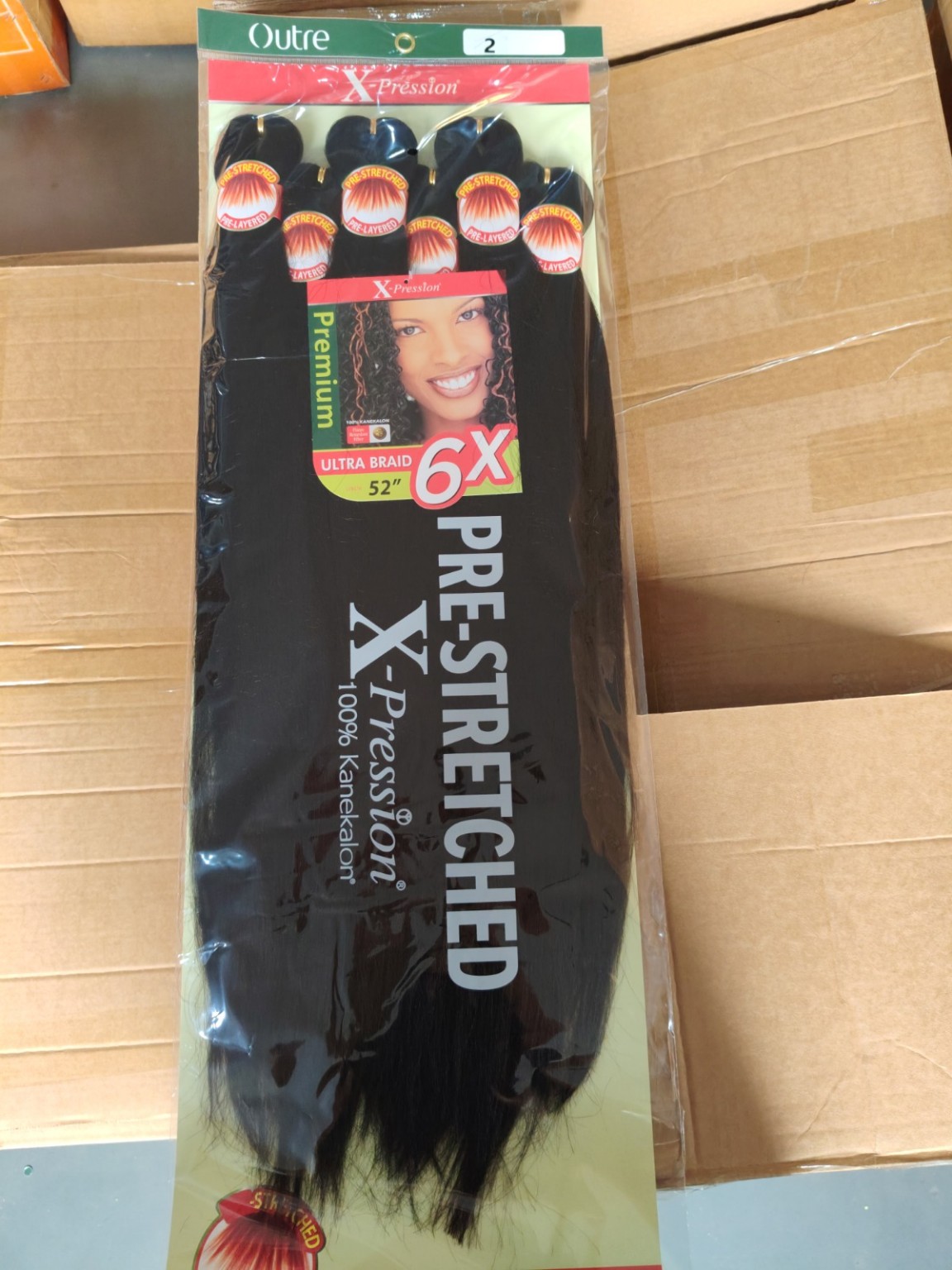 Outre X-Pression 6X pre-stretched ultra braid hair in color 2 Dark Brown