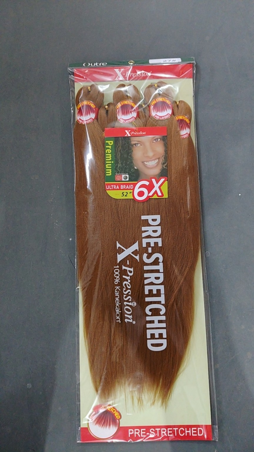 Outre X-Pression 6X pre-stretched ultra braid hair in color 27 Honey Blonde