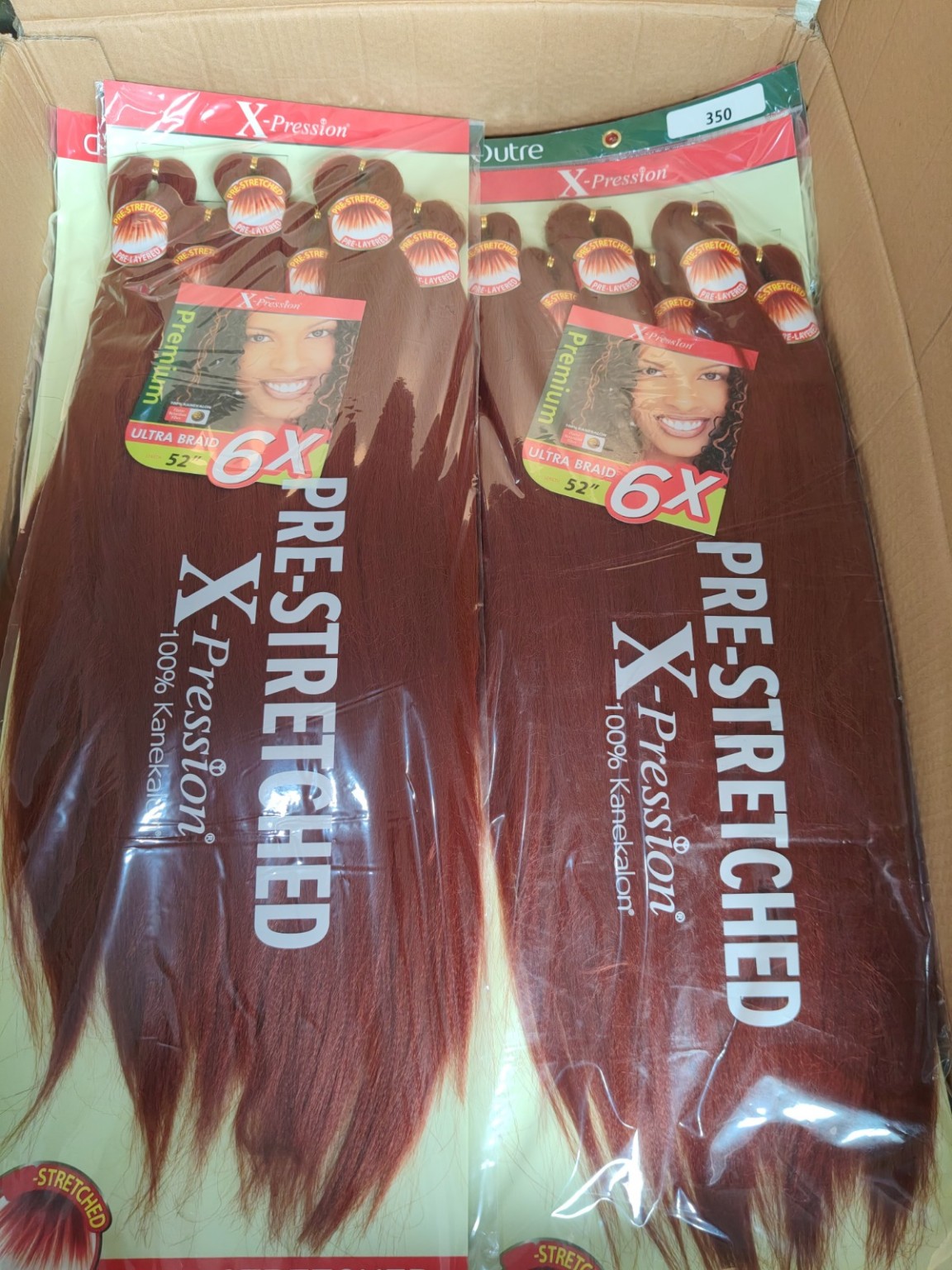Outre X-Pression 6X pre-stretched ultra braid hair in color 350 Copper Auburn