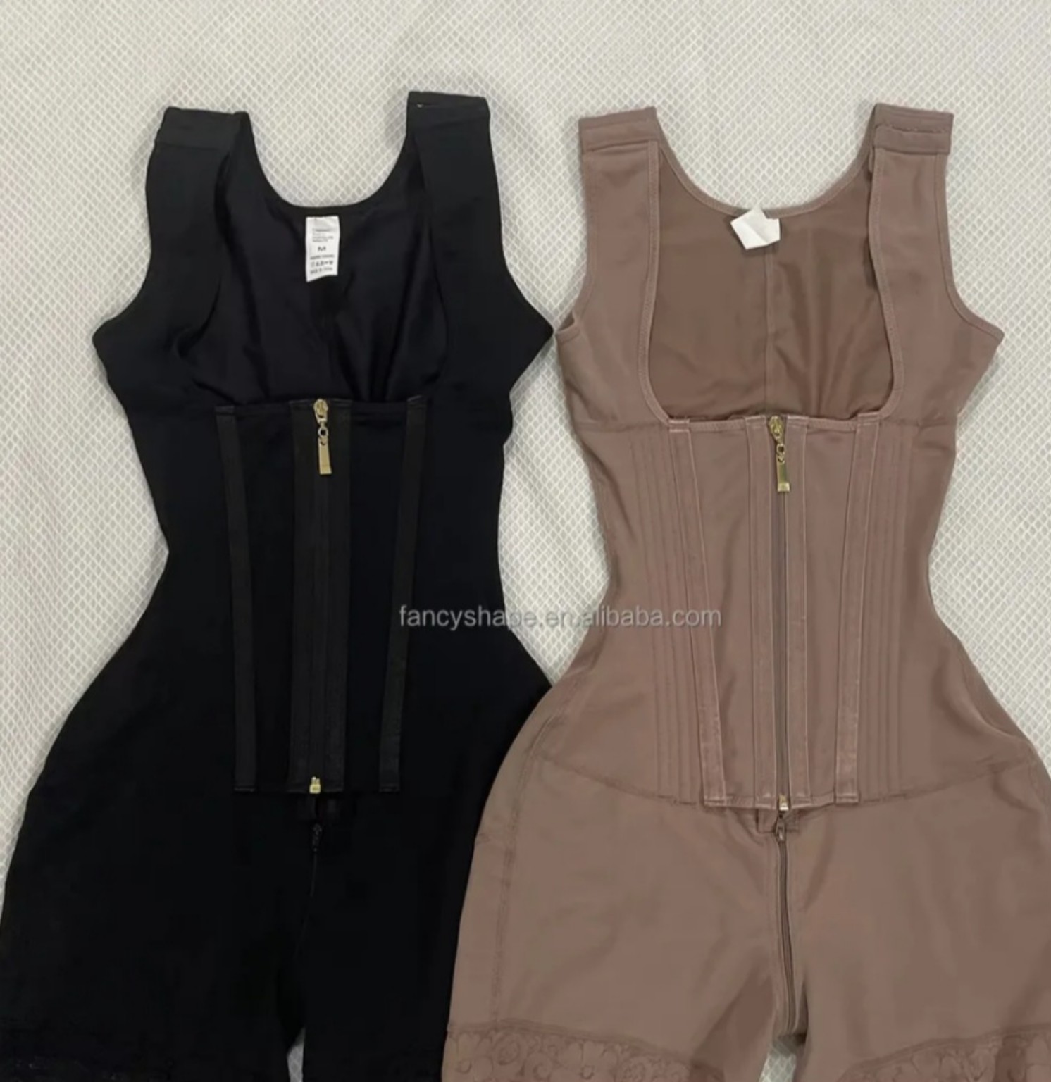 Black and brown sleeveless supportive compression body shapers with front zippers